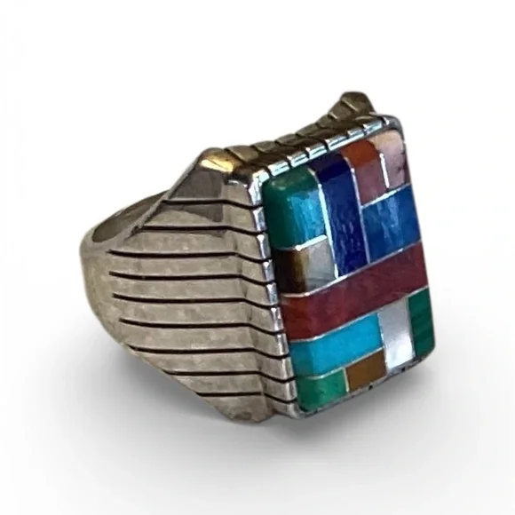 Vintage Navaho silver & 12 stone men’s ring handcrafted signed Ray Jack. Size 12